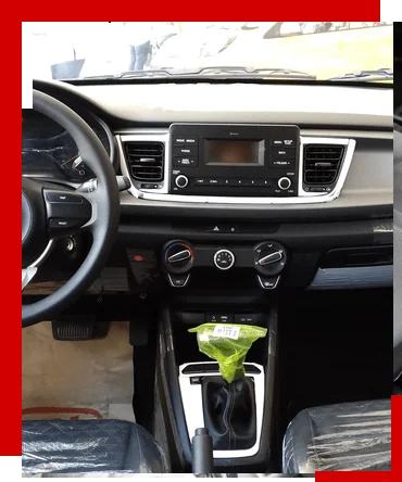 Салон Kia Rio: руль и приборная панель